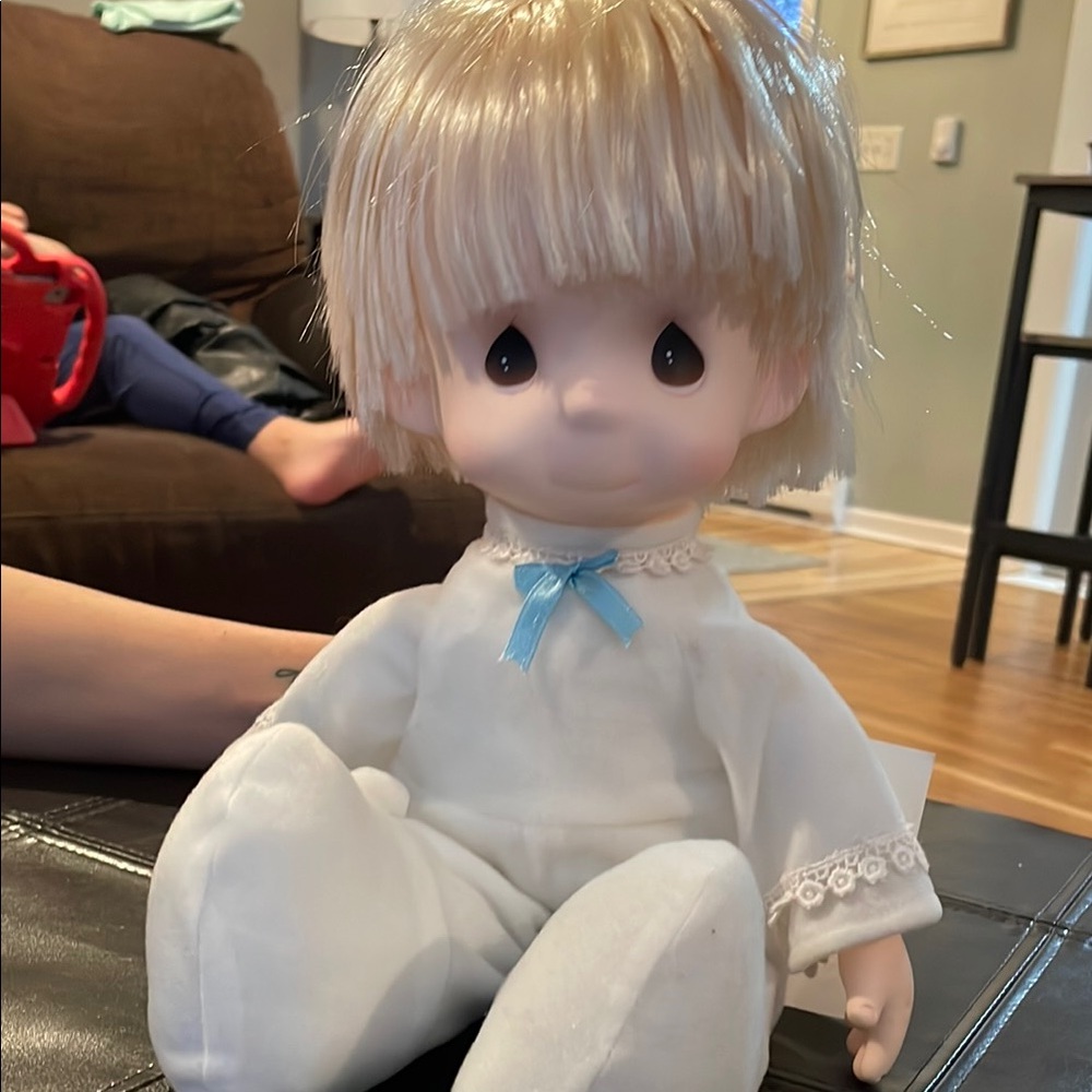 Adorable White Plush Doll with Blue Ribbon